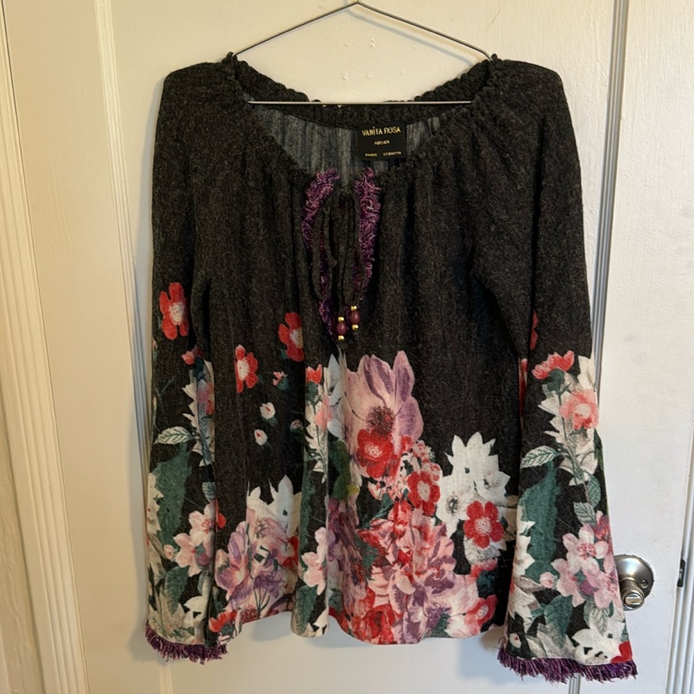 Vanita Rosa Atelier Paris St. Barth Floral Sweater on w/purple fringe details.